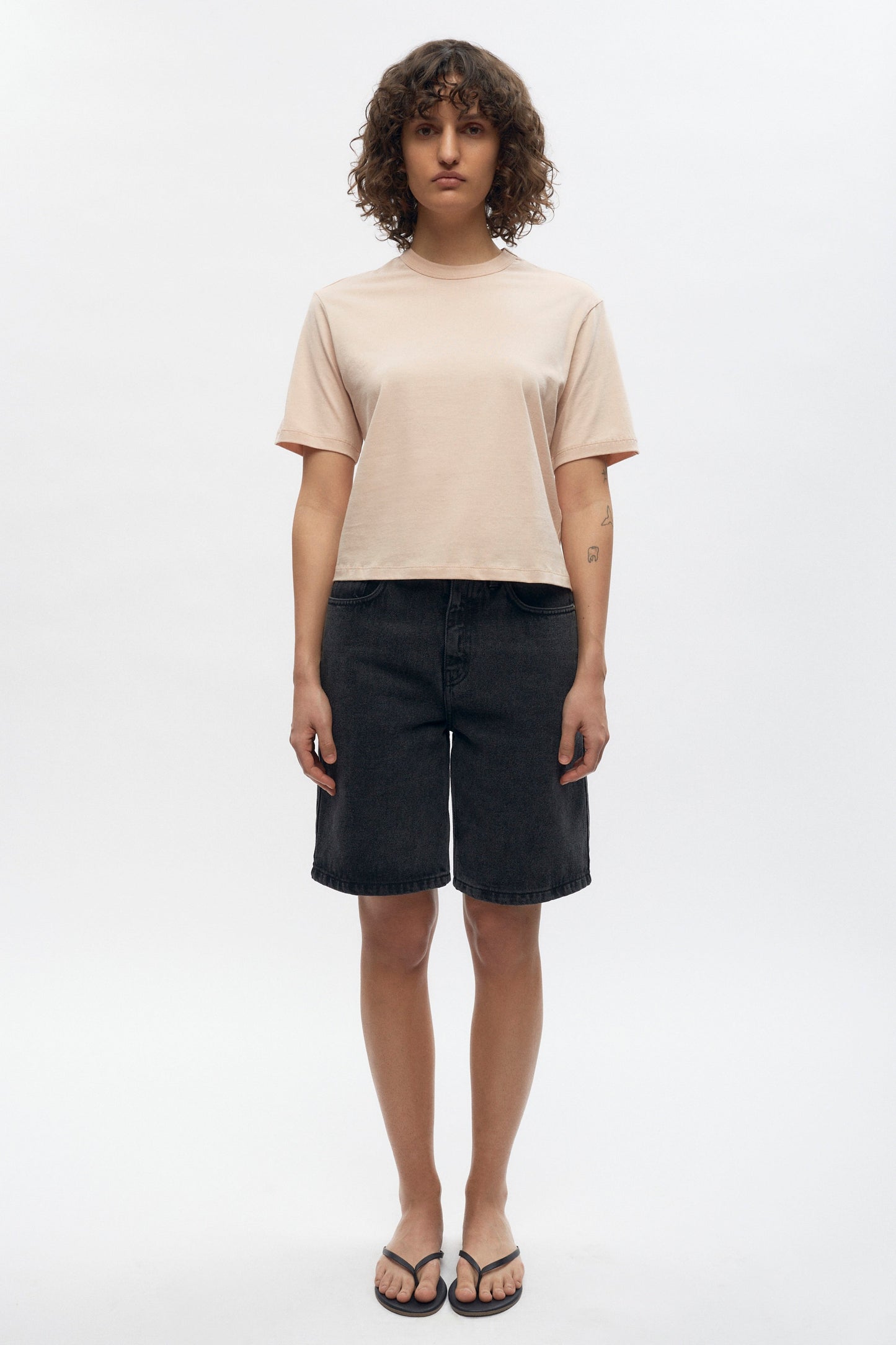 Francis is 5ft 9.5in, a regular size XS and wearing a S.