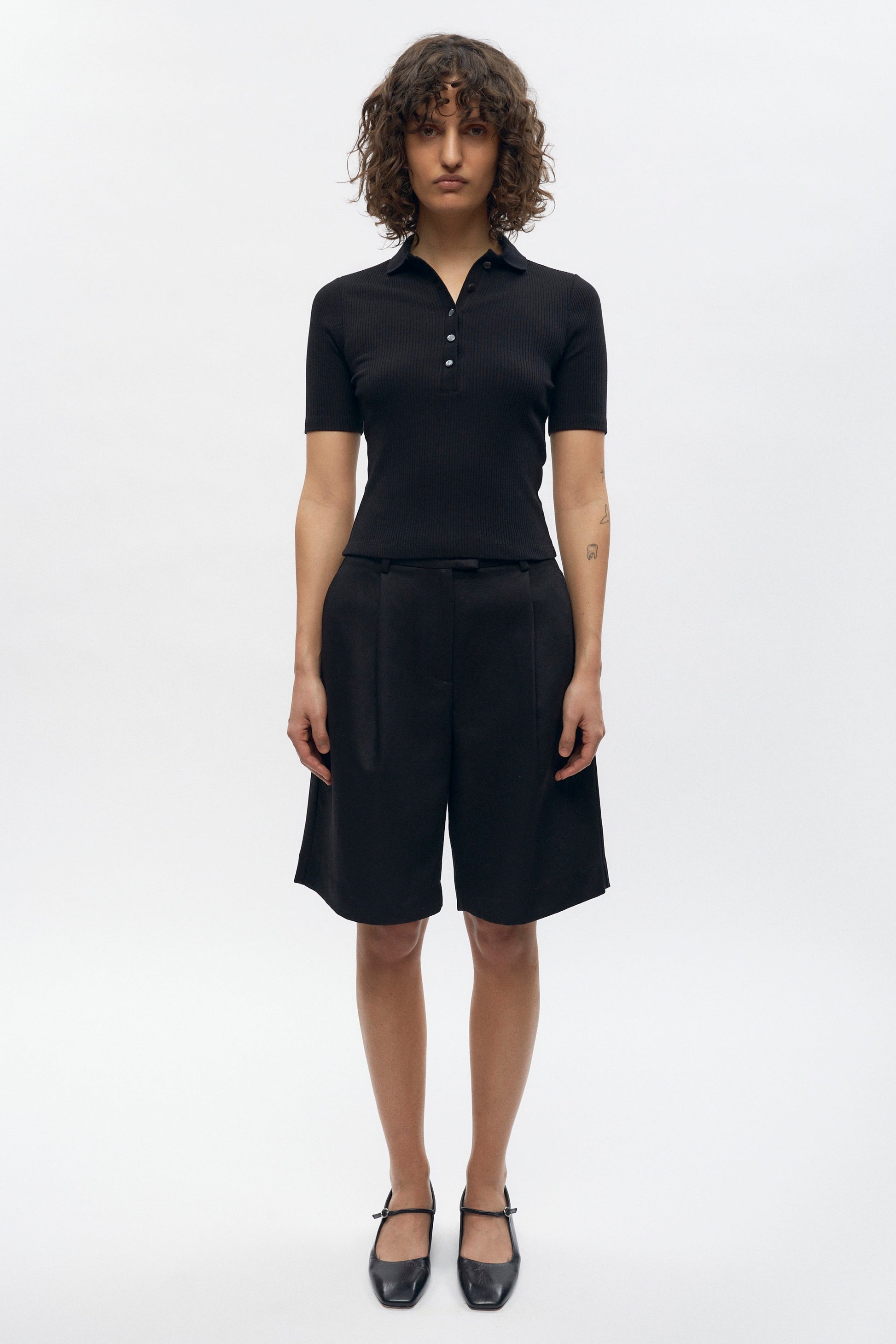 Francis is 5ft 9.5in, a regular size XS and wearing a S.