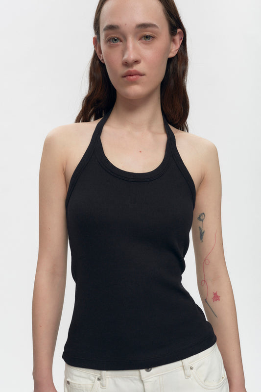 Elizabeth is 5’11" is a regular XS and is wearing an XS.